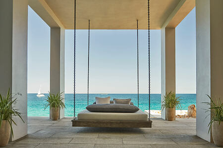 Luxury view of sea from a swing at Four Seasons Anguilla