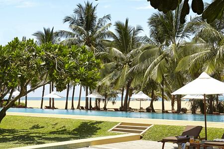 Pool and beach view at Jetwing Beach Negombo Sri Lanka