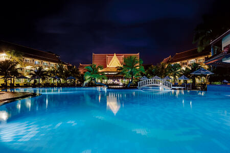 Pool area lit up at night at Sokha Beach Resort Cambodia
