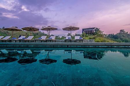 Pool with umbrellas at Santani Sri Lanka