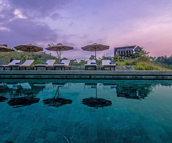 Pool with umbrellas at Santani Sri Lanka