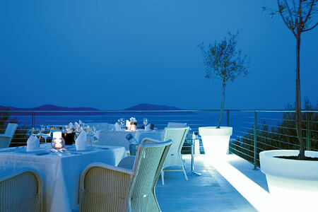 Restaurant at night at Elounda Gulf Villas and Suites Crete
