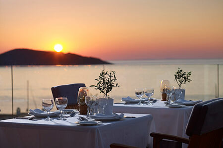 Sunset dining with a sea at Porto Elounda Golf and Spa Creteview