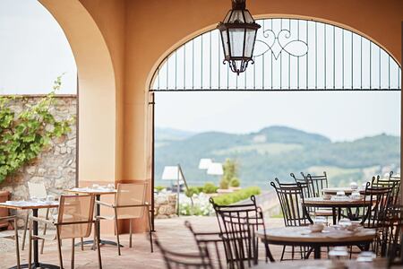Terrace with view of hills at Castello di Casole Italy