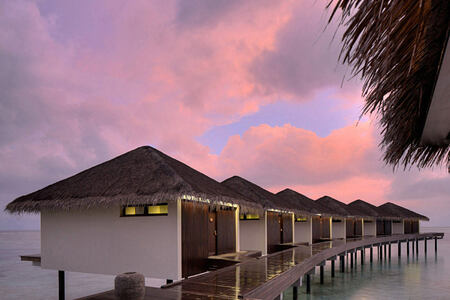 Dusk over accommodation at The Residence Maldives