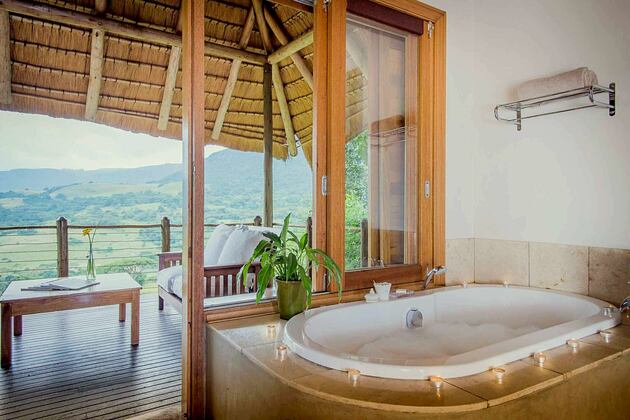 Villa bathroom and view at Karkloof Safari Spa KZN South Africa