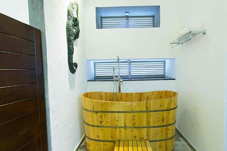 Bathroom in Deluxe twin at Aliya Resort and Spa Sri Lanka