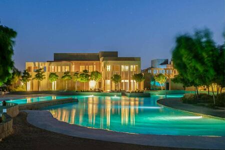 Zulal Wellness Resort Exterior at Night