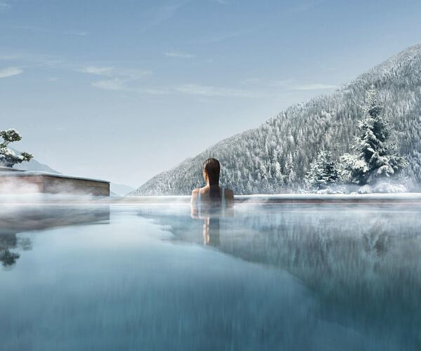 Lefay Dolomites outdoor pool winter woman