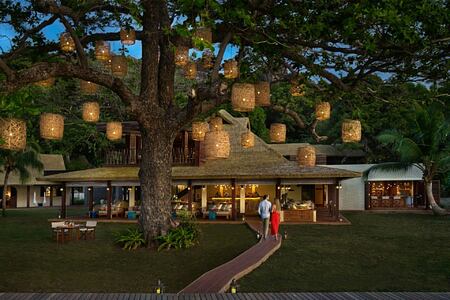 The island cafe at dusk at six senses zil pasyon seychelles