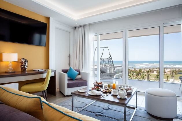 Living area of one of the suites at vichy morocco showing viewing out to the ocean