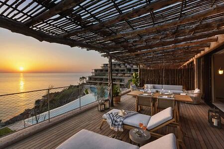 Sunset viewacross the bay from a bedroom suite at Six Senses Ibiza