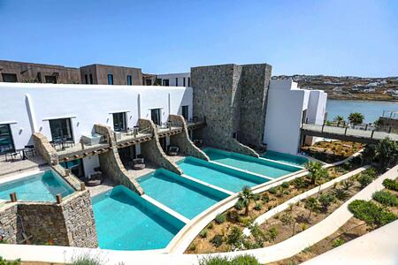 Aeonic Suites and Spa Mykonos exterior of rooms showing private pools