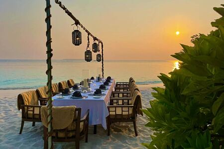 Dining on the beach at Amilla Maldives
