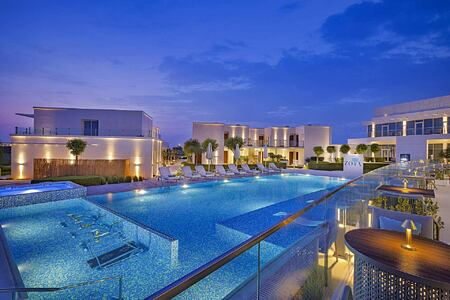Pool at night at ZOYA Health and Wellbeing Resort Ajman