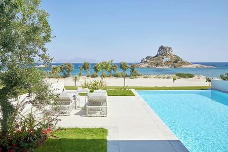 Bedroom with private pool overlooking Kastri island Ikos Aria Kos