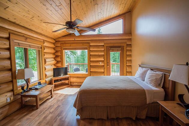 2 Bedroom log suite bedroom at Alpine Meadows Clearwater Canada