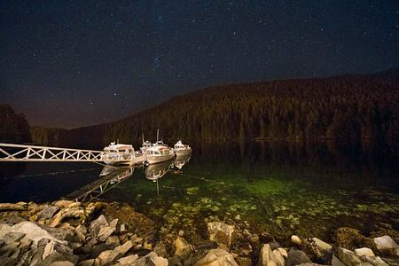 Boats at night at Spirit Bear Lodge Canada