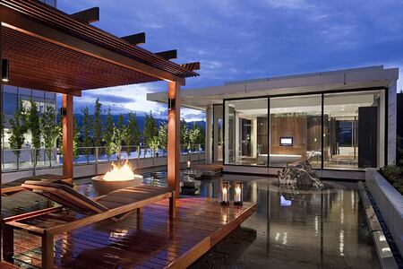 Outdoor upstairs area with fire pit at Fairmont Pacific Rim Canada