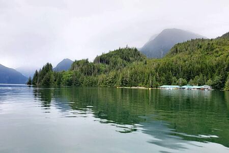View across water towards Knight Inlet Lodge Canada