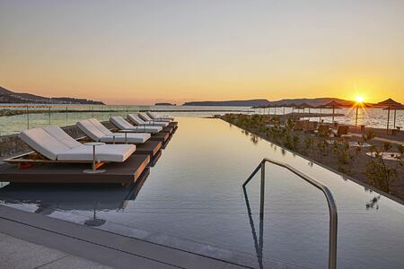 Sunset across the pool at Costa Navarino Greece