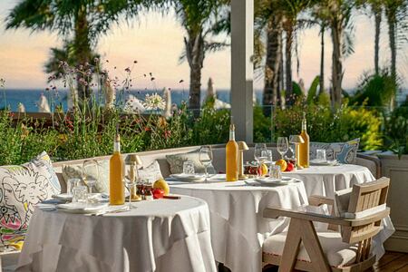 Dining tables on the terrace at Parklane Cyprus